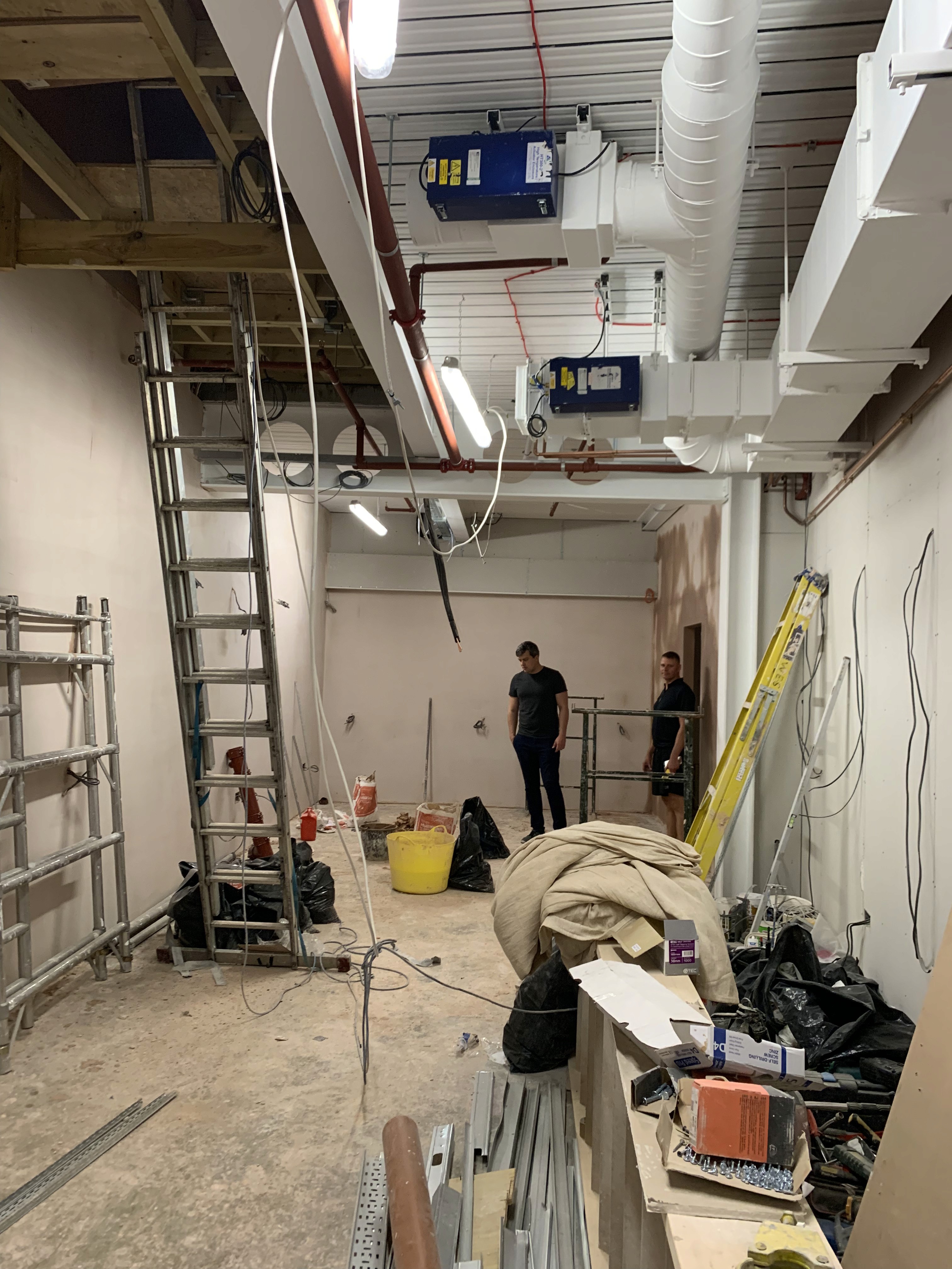 Modern building corner with dark glass windows