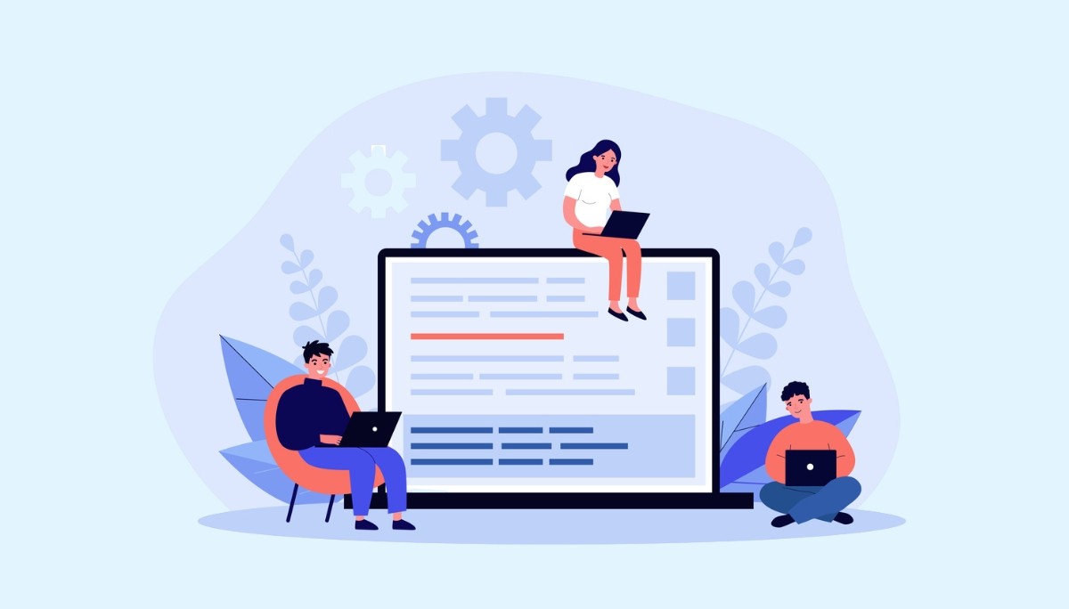 Illustration of engineers collaborating around a large computer interface, each using laptops—symbolizing the process of generating effective engineering cover letters with the help of digital tools.