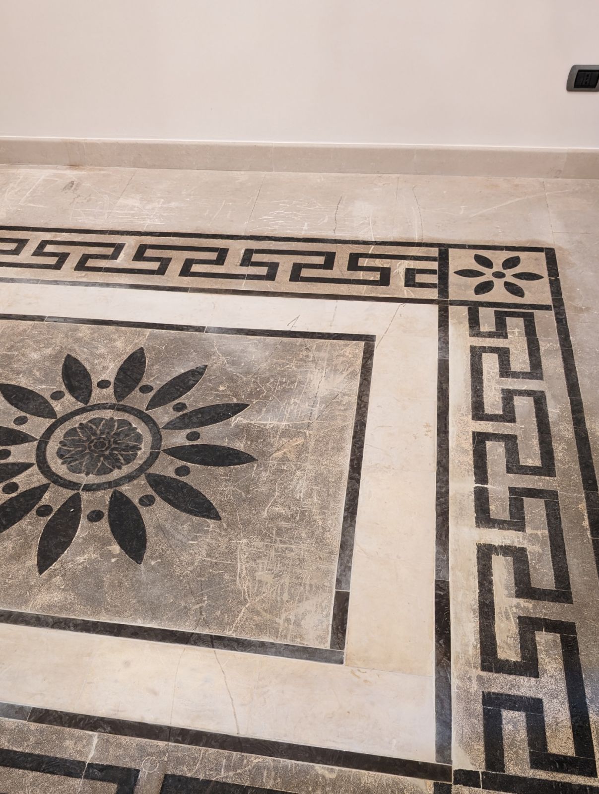 Pitch stone and stone with rosette, before treatment