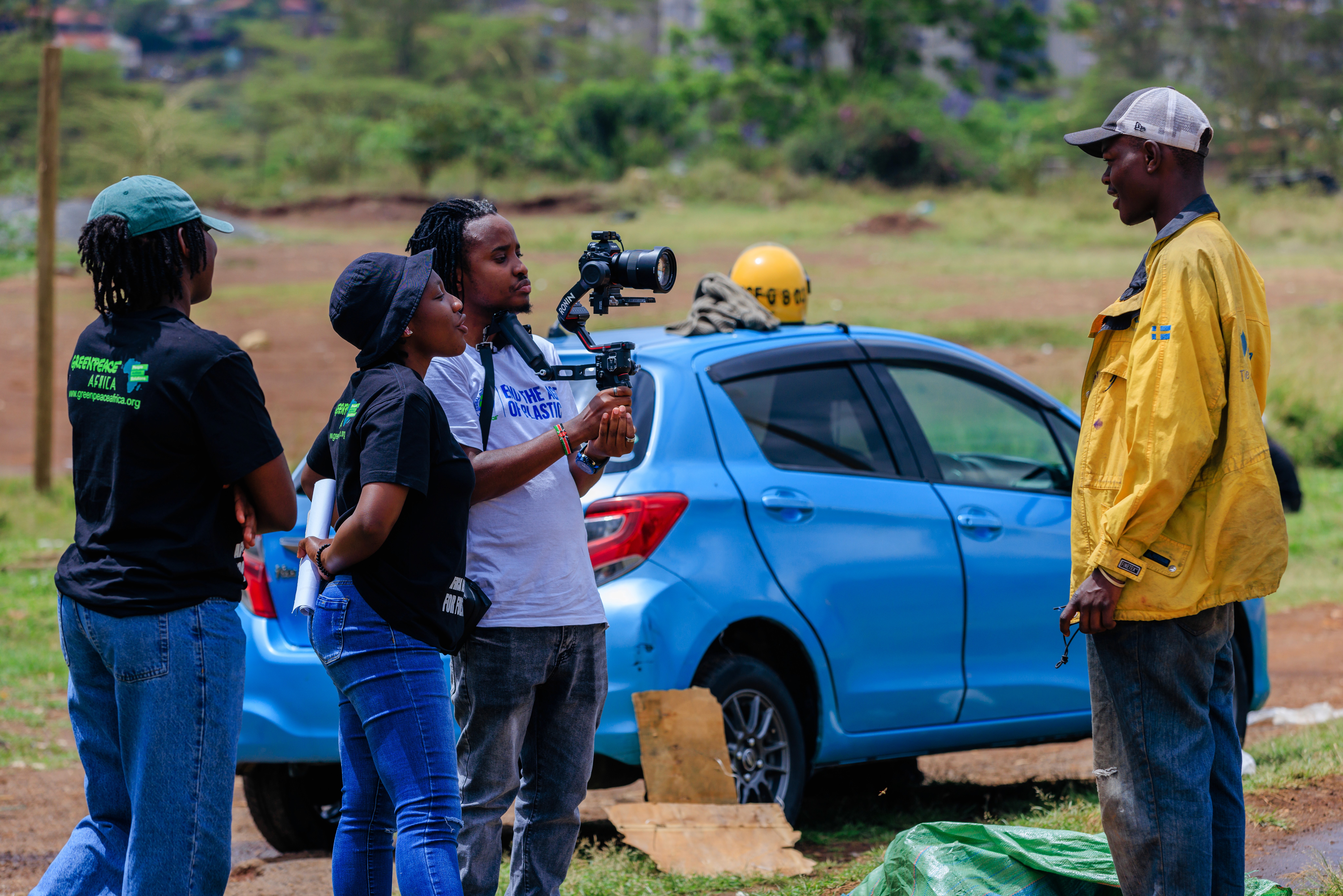 woman smiling and holding a dog