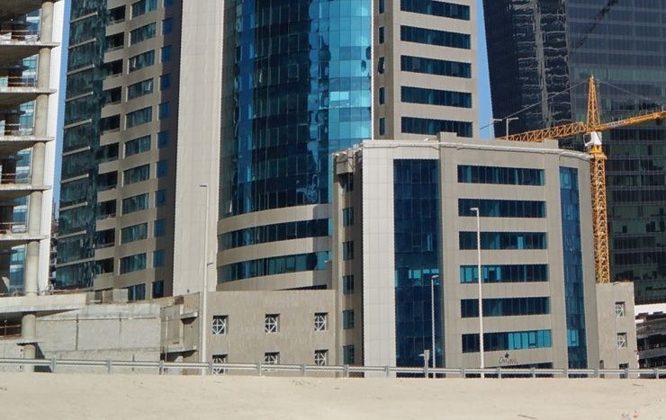 Luxury high-rise view of Ontario Tower; contact our real estate agent for premium office and residential units.