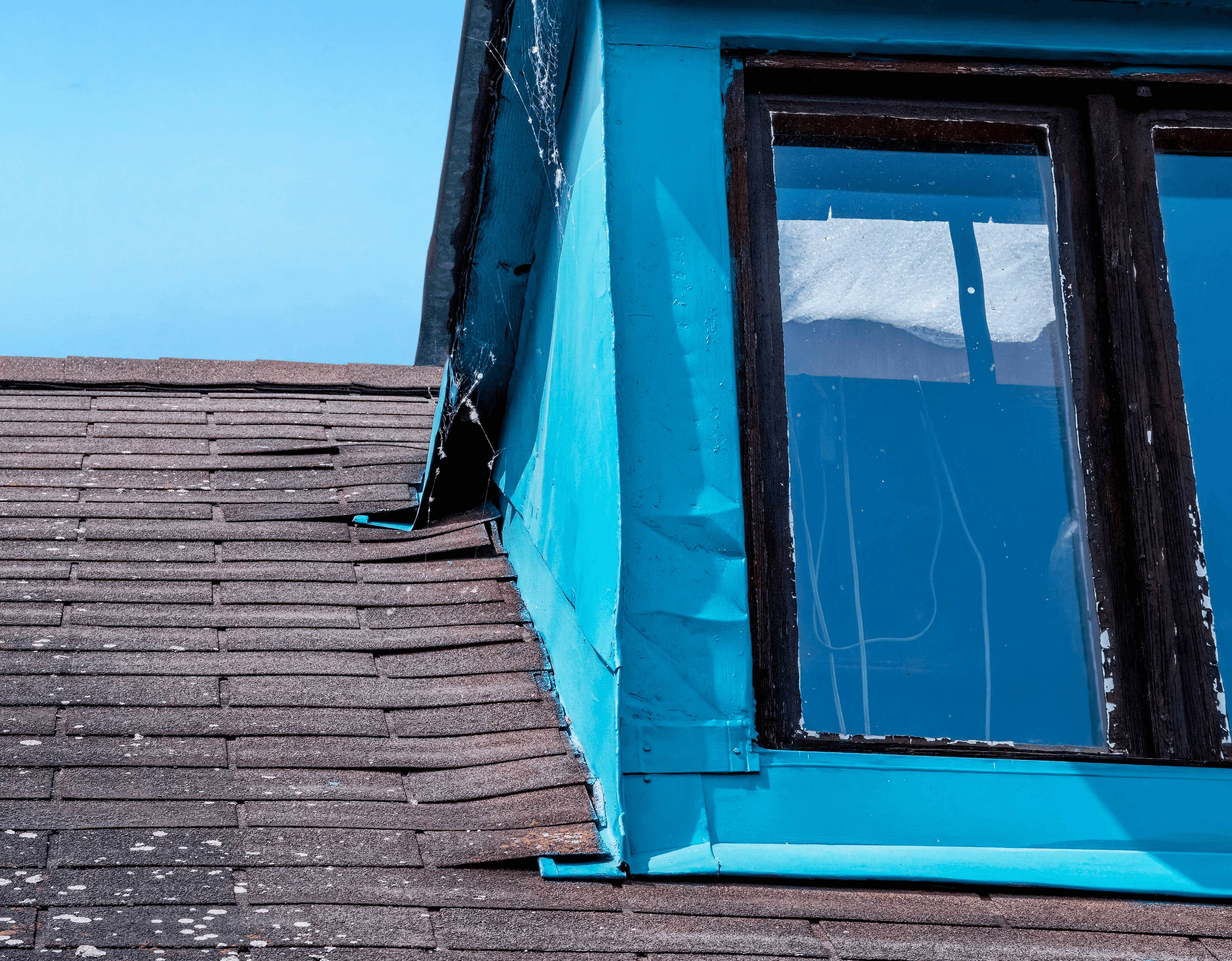 a close up of a rain gutter on a roof