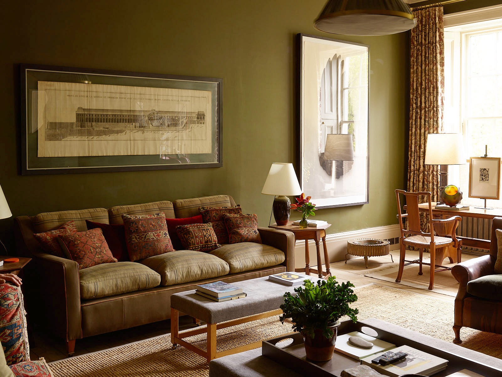 View of a bedroom entryway with an open door, showing a glimpse of the interior including the bed and surrounding decor.