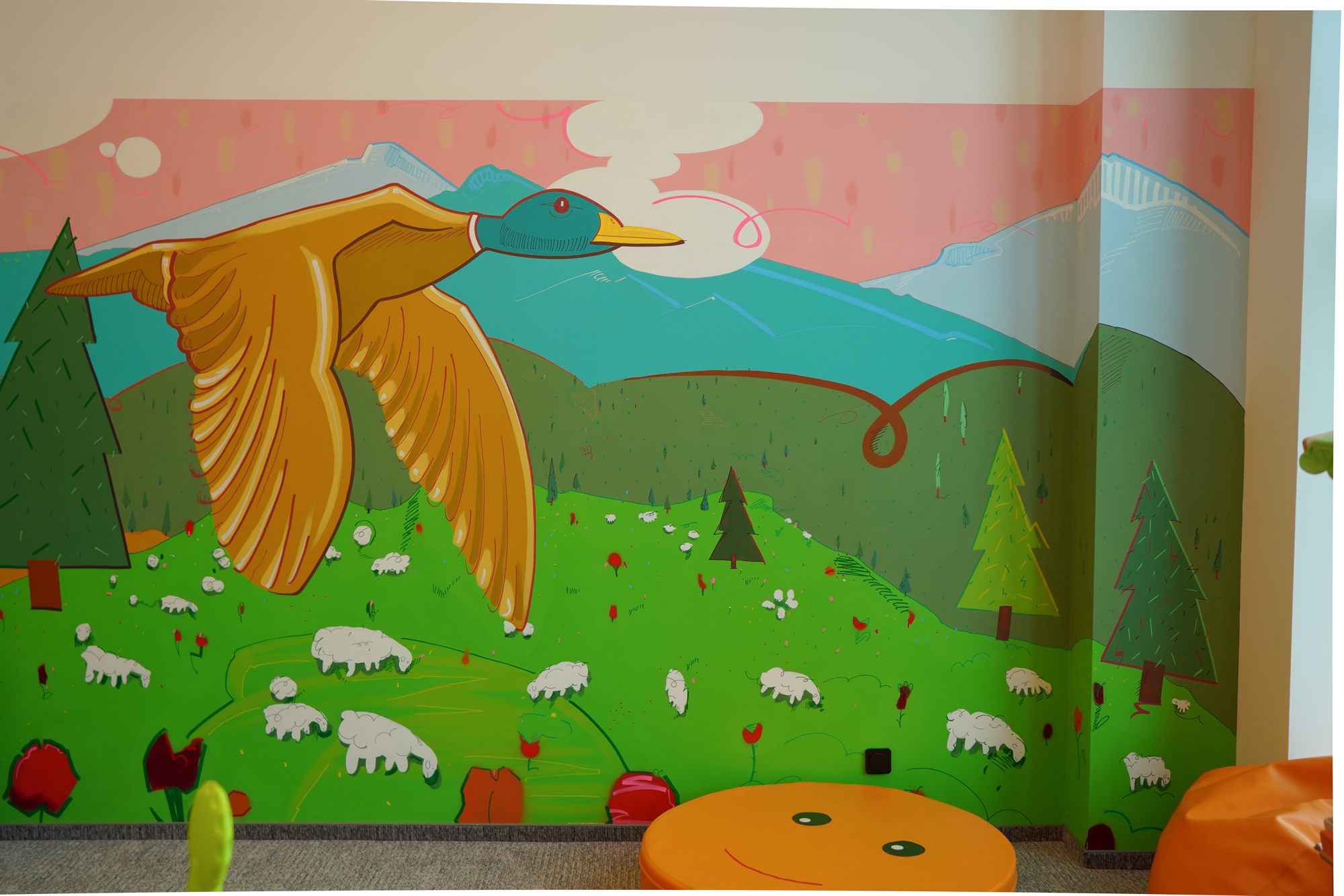 The wall with the duck and spruces