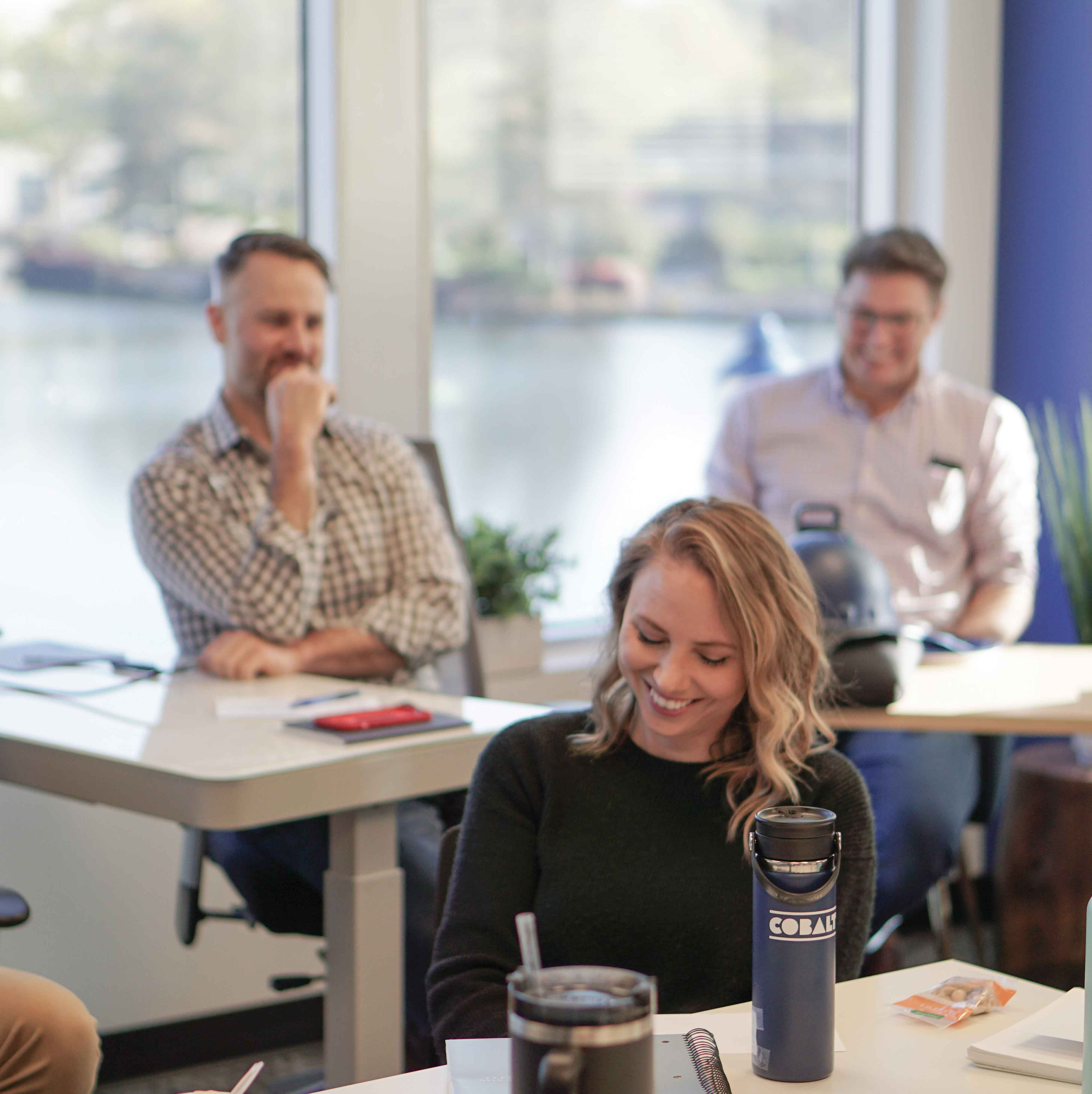 Car driving on a wet road at night