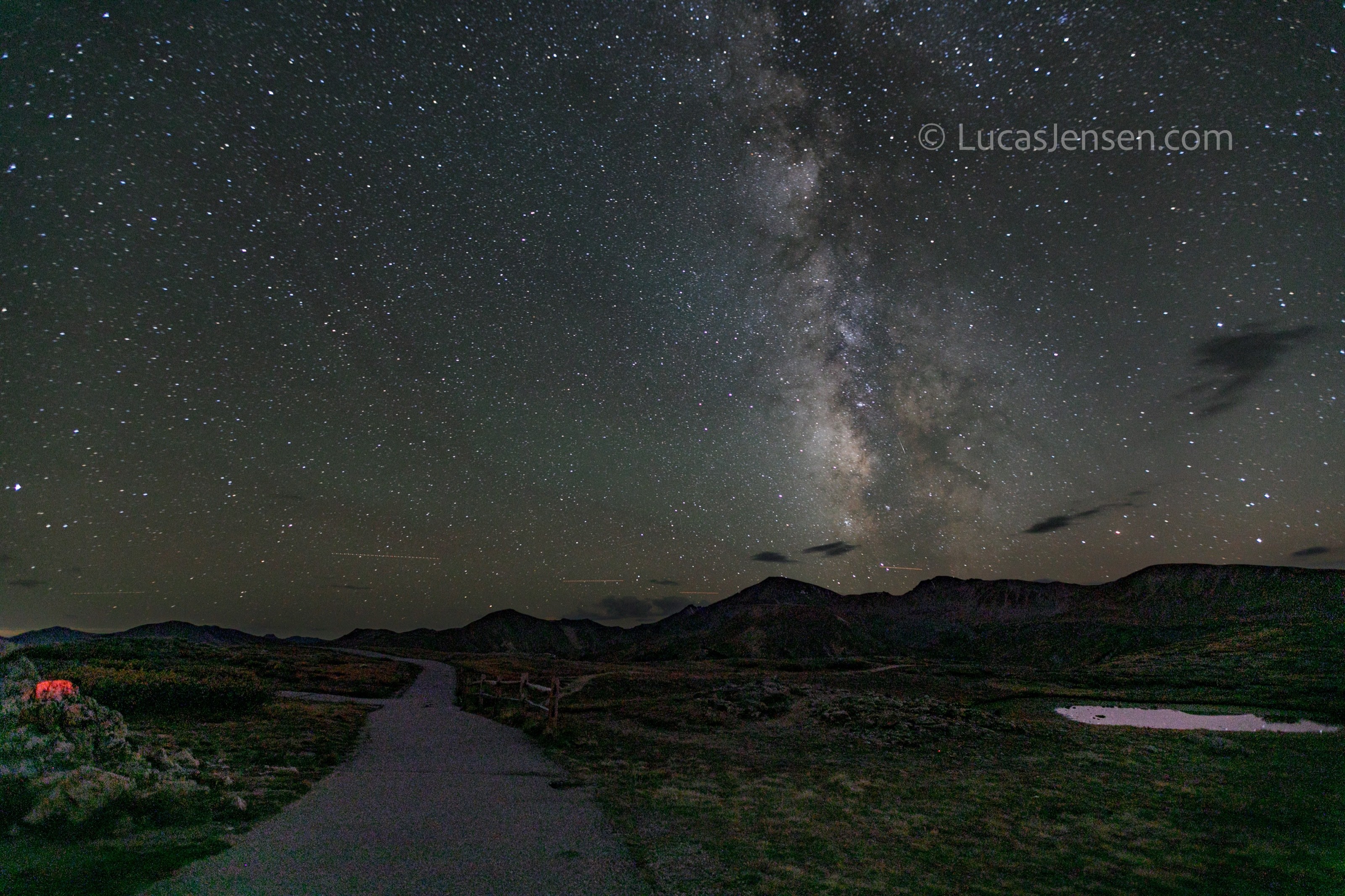 landscape photograph of mountains, water, desert, or coast by Lucas Jensen