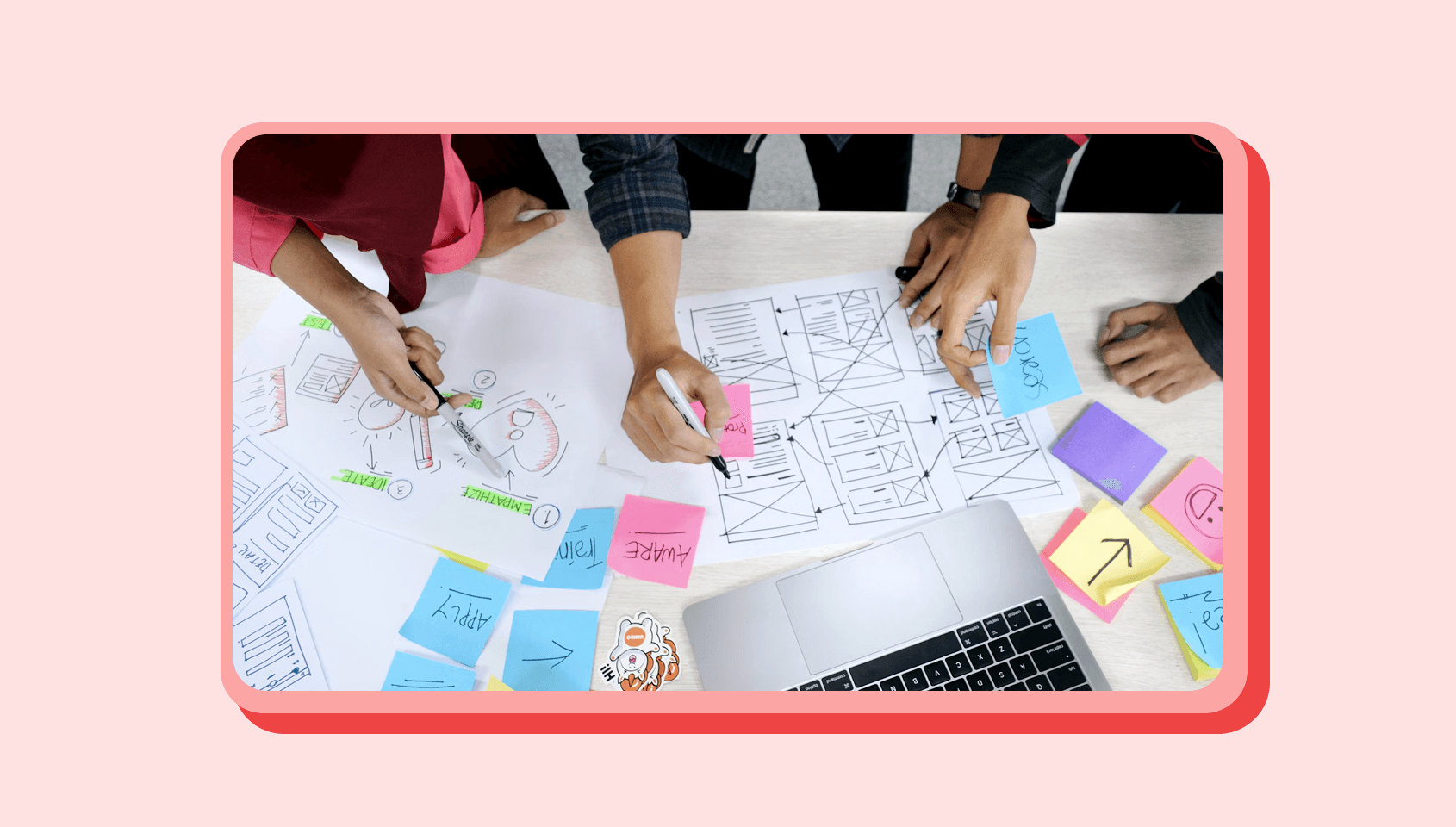 A group of people figuring out a workflow, which can be easily put in work by automation.