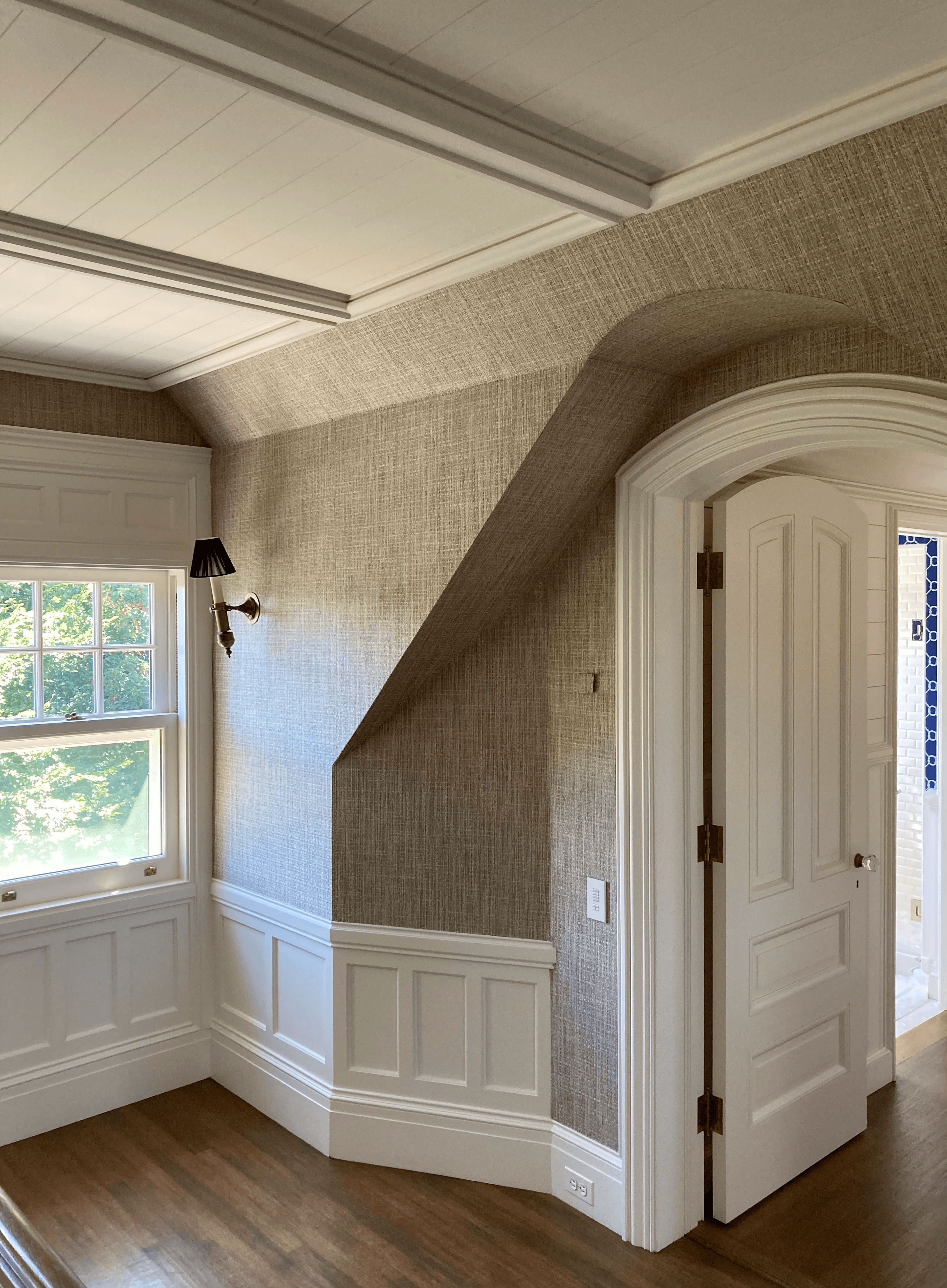 Interior painting project with freshly painted walls, trim, and custom architectural details.