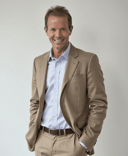 Portrait of Greg Waddell at his desk
