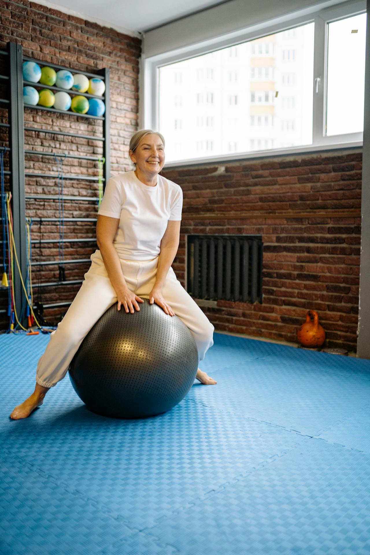 women sitting on a ball