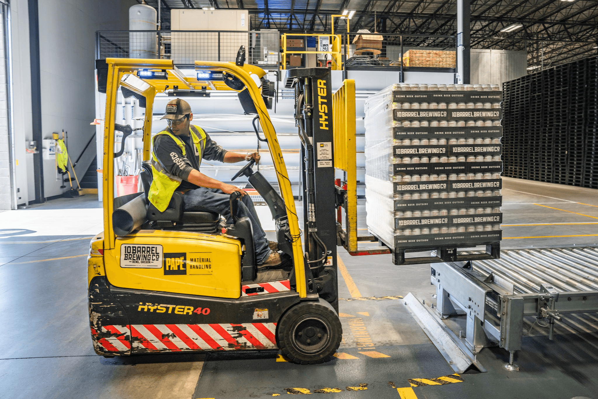 a forklift moves the items