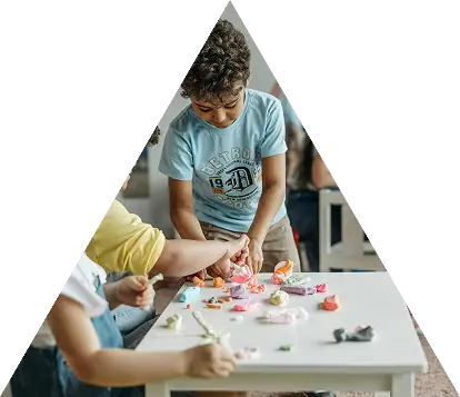 Children happily playing in a safe and colorful daycare classroom