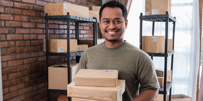 Malaysian business owner managing orders
