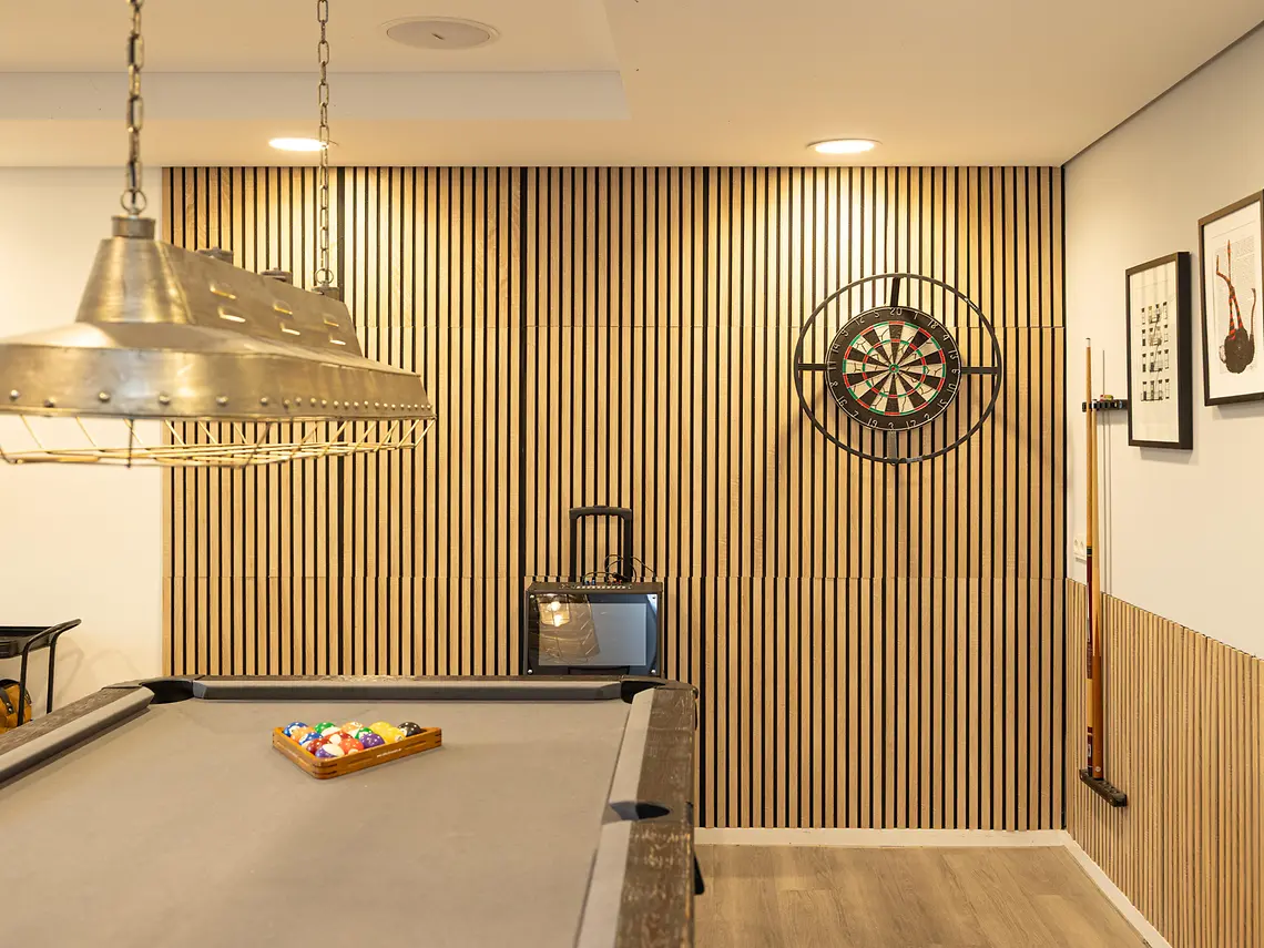 Games area in student accommodation in Frankfurt with pool table and dart board