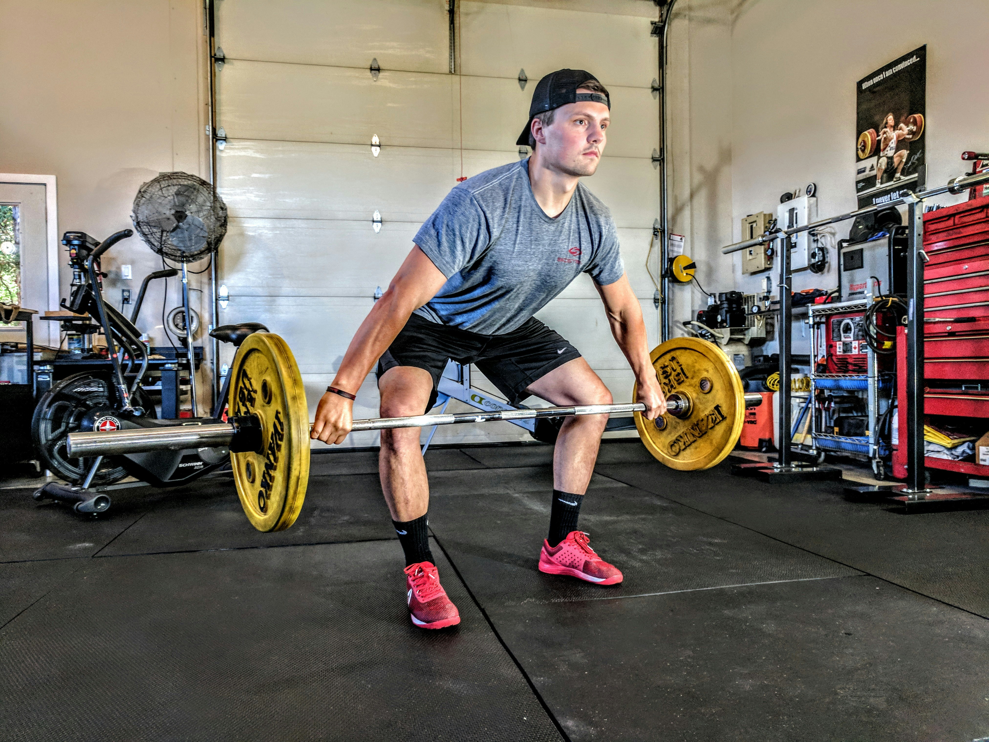 Man deadlifting in a gym — strength training to protect lean muscle during weight loss on Ozempic