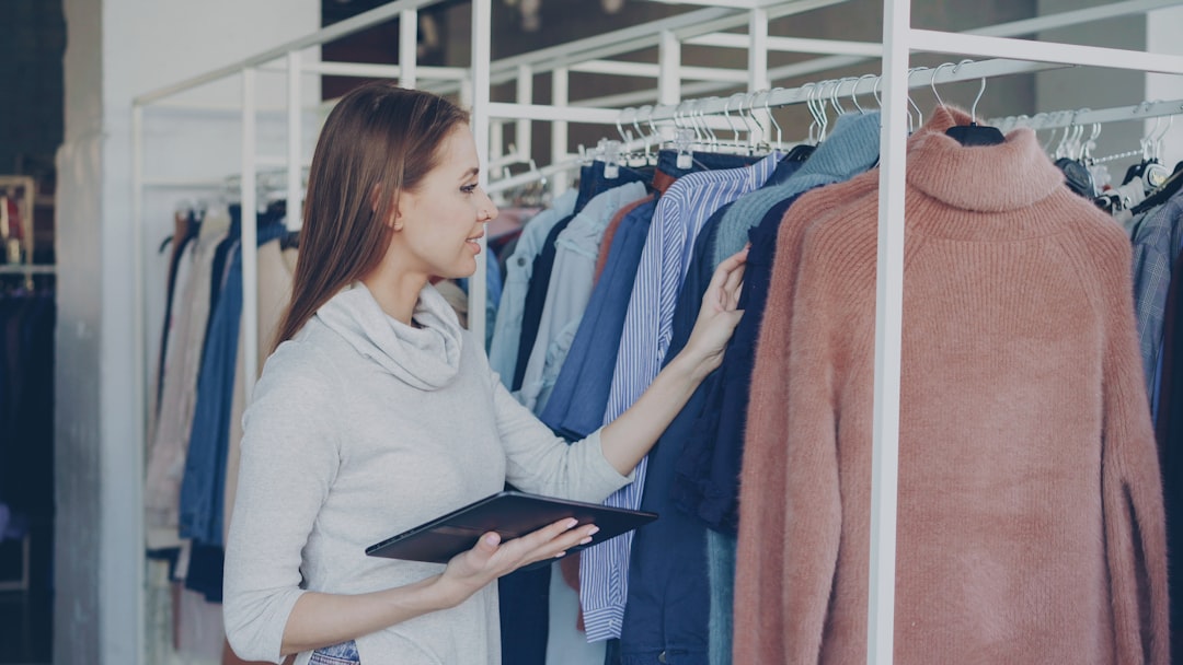 Woman shopping for clothes in a boutique.