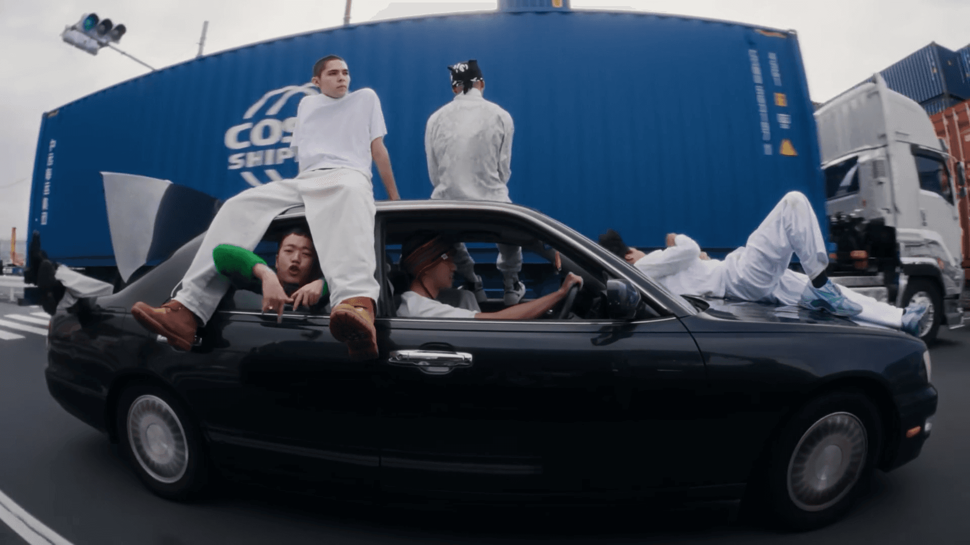 Busy city street at night with glowing billboards