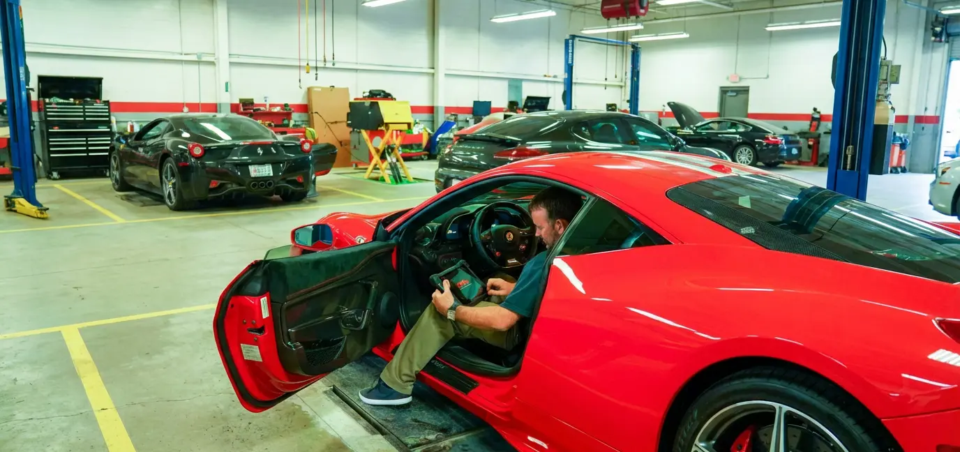 Ferrari being checked by Mechanic at Ideal