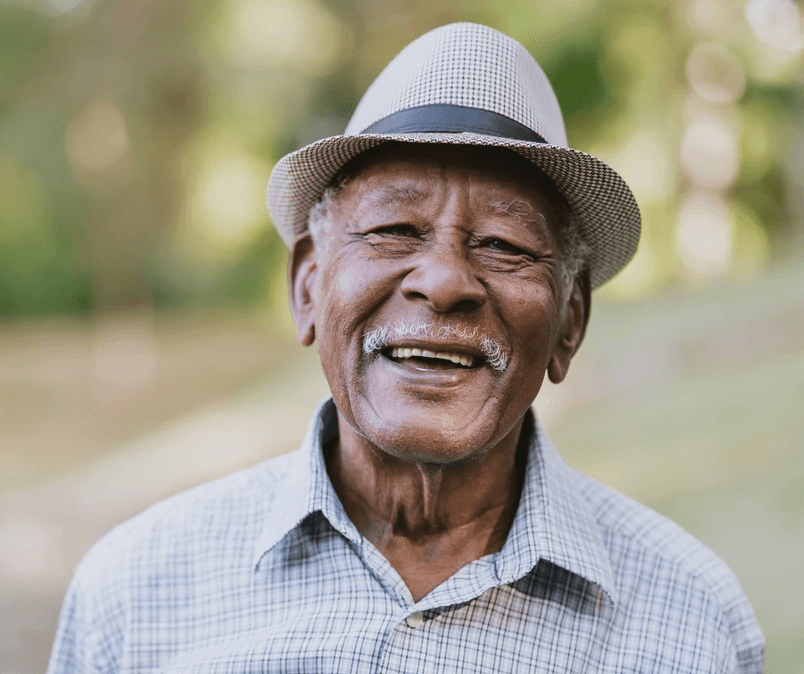 a woman in a white lab coat pointing at something