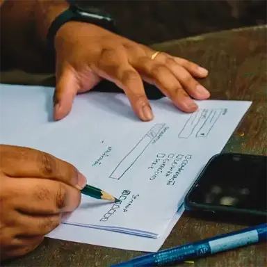 User drawing a prototype during an interview.