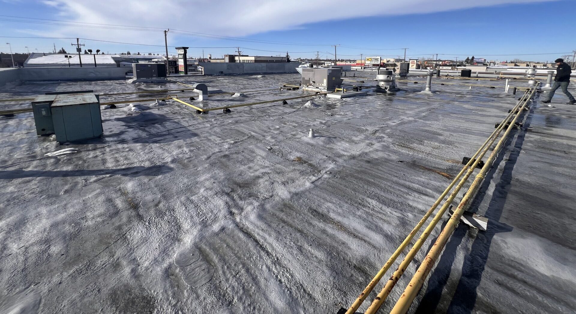a view of a city with mountains in the background