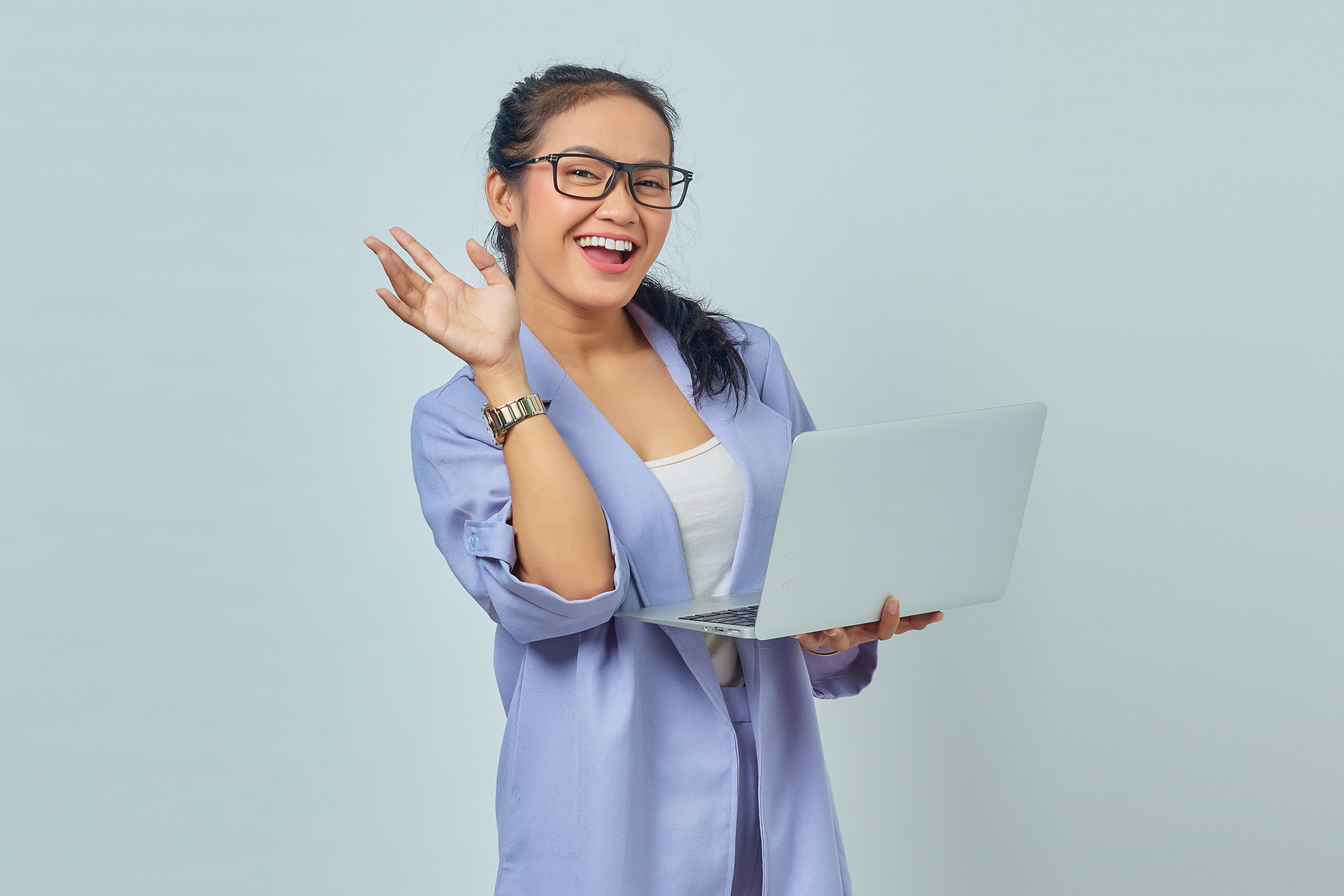 person waving her hand - Sales Mindset