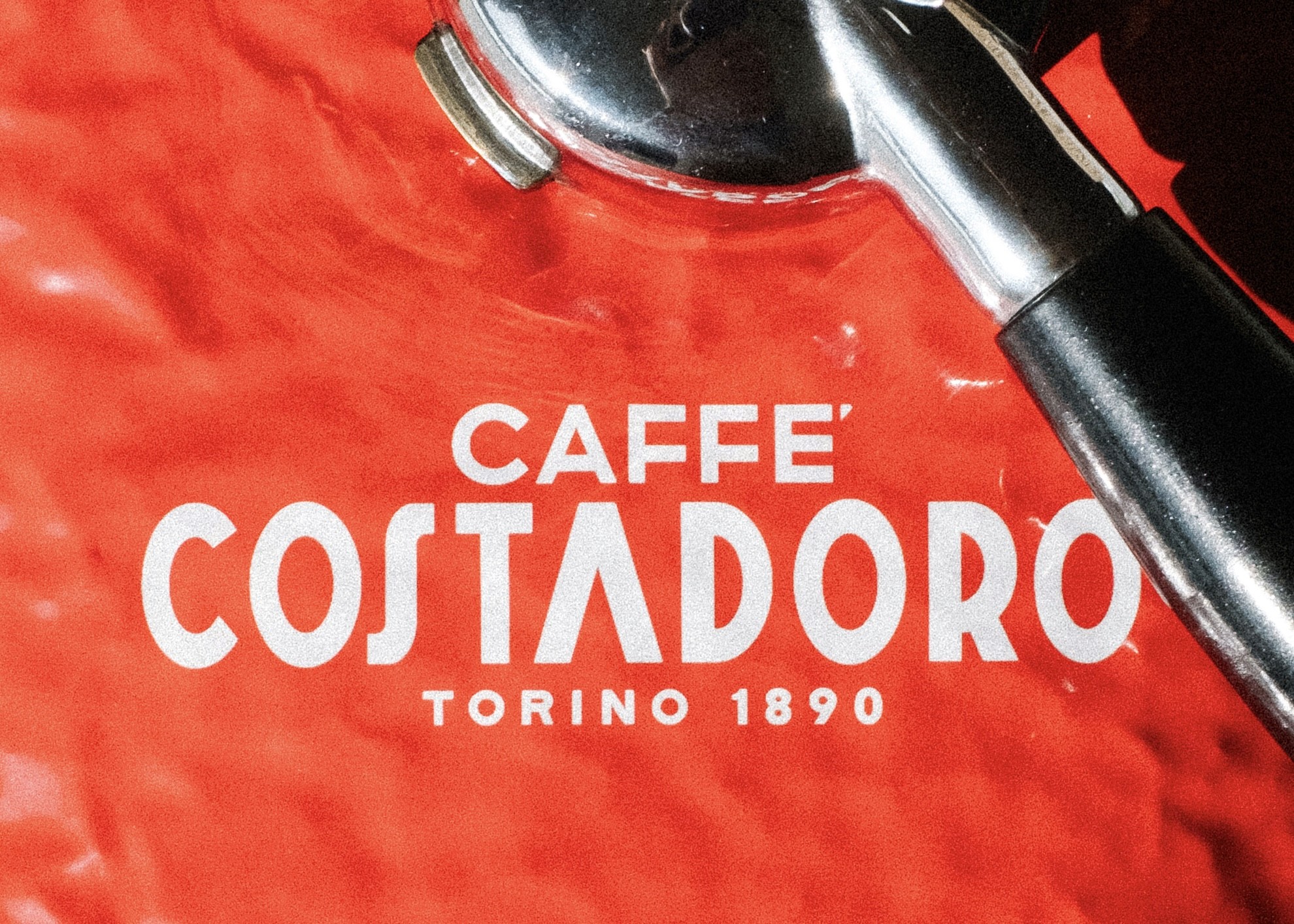 Single-story villa with wide glass walls and warm interior lights, Amberline Villas