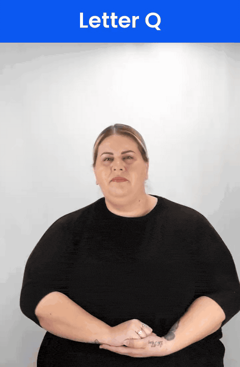 Animated GIF: a Deaf signer signs Q in ASL, the index finger and thumb pointing down.