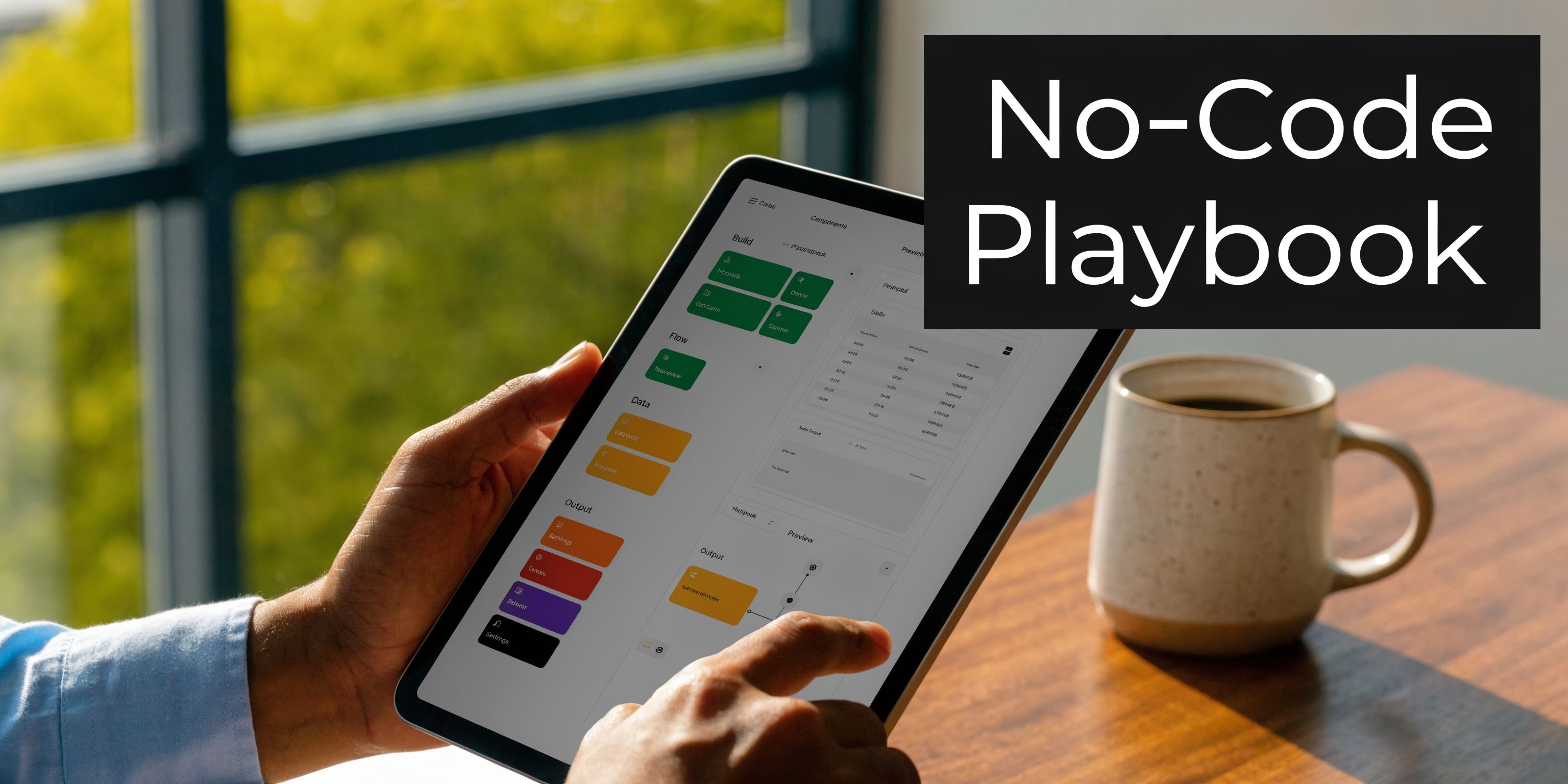 A person using a tablet to build an application interface with a no-code development platform.