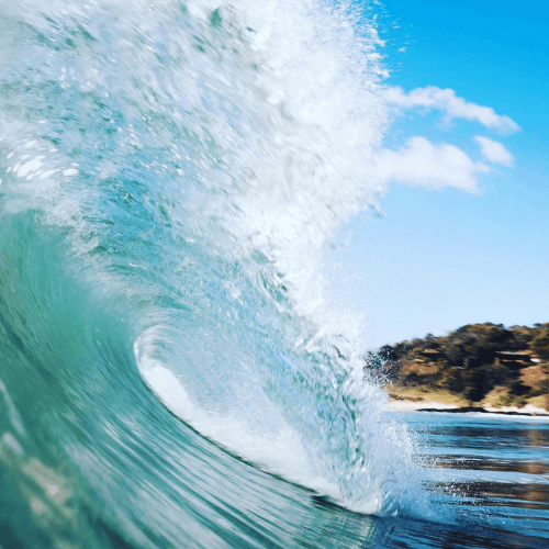 Crashing wave with white foam – surfboard rental in playa-maderas