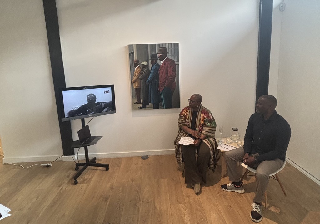 Founder Alain Defise speaking to crowd at opening party