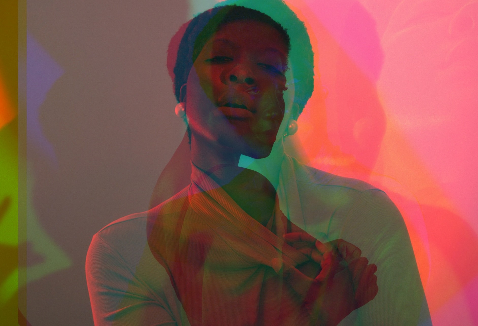 Natural light portrait of South Asian woman smiling with scarf