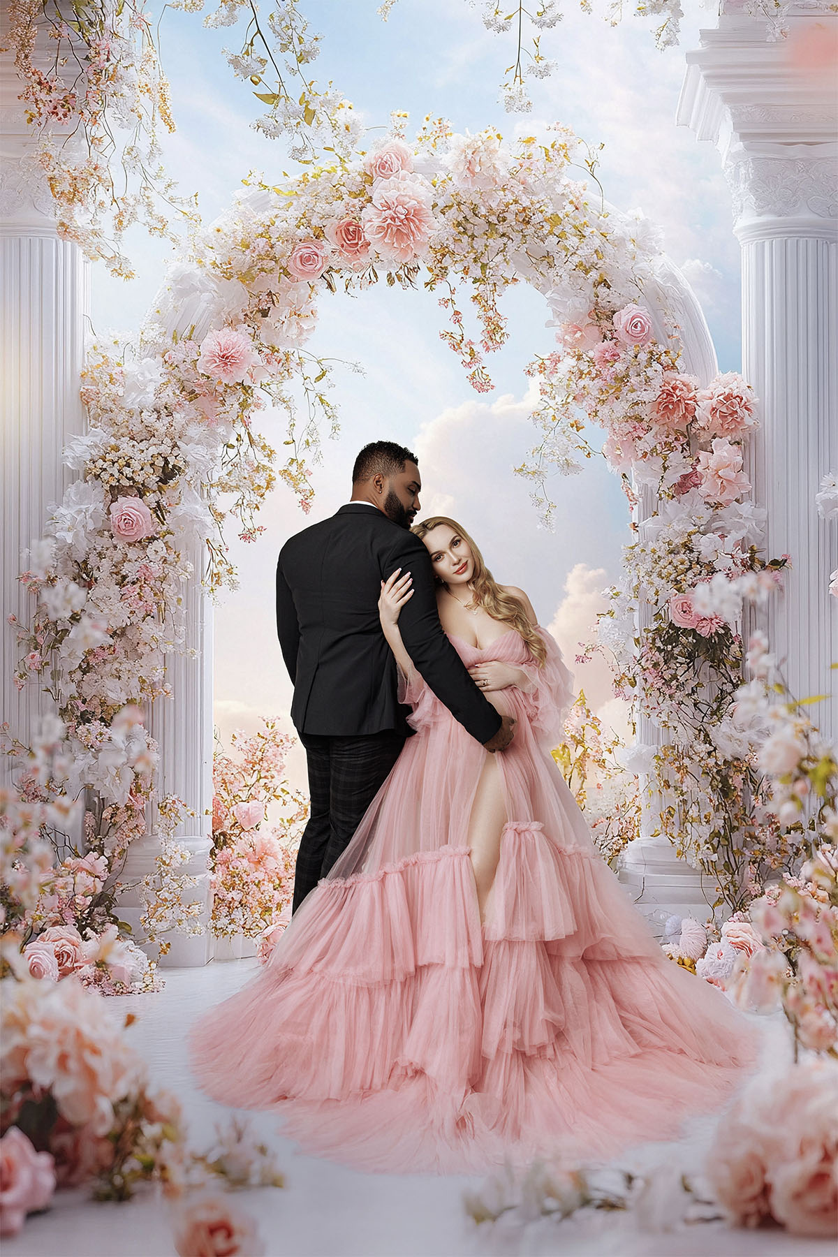 Smiling expecting mom in soft gown during maternity photoshoot in Orange County.