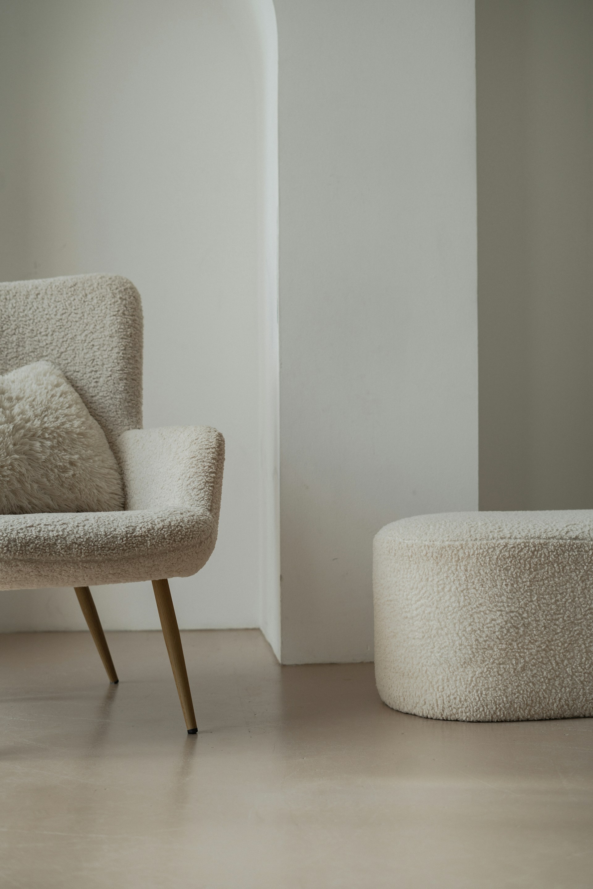 a minimalist sofa with white floor