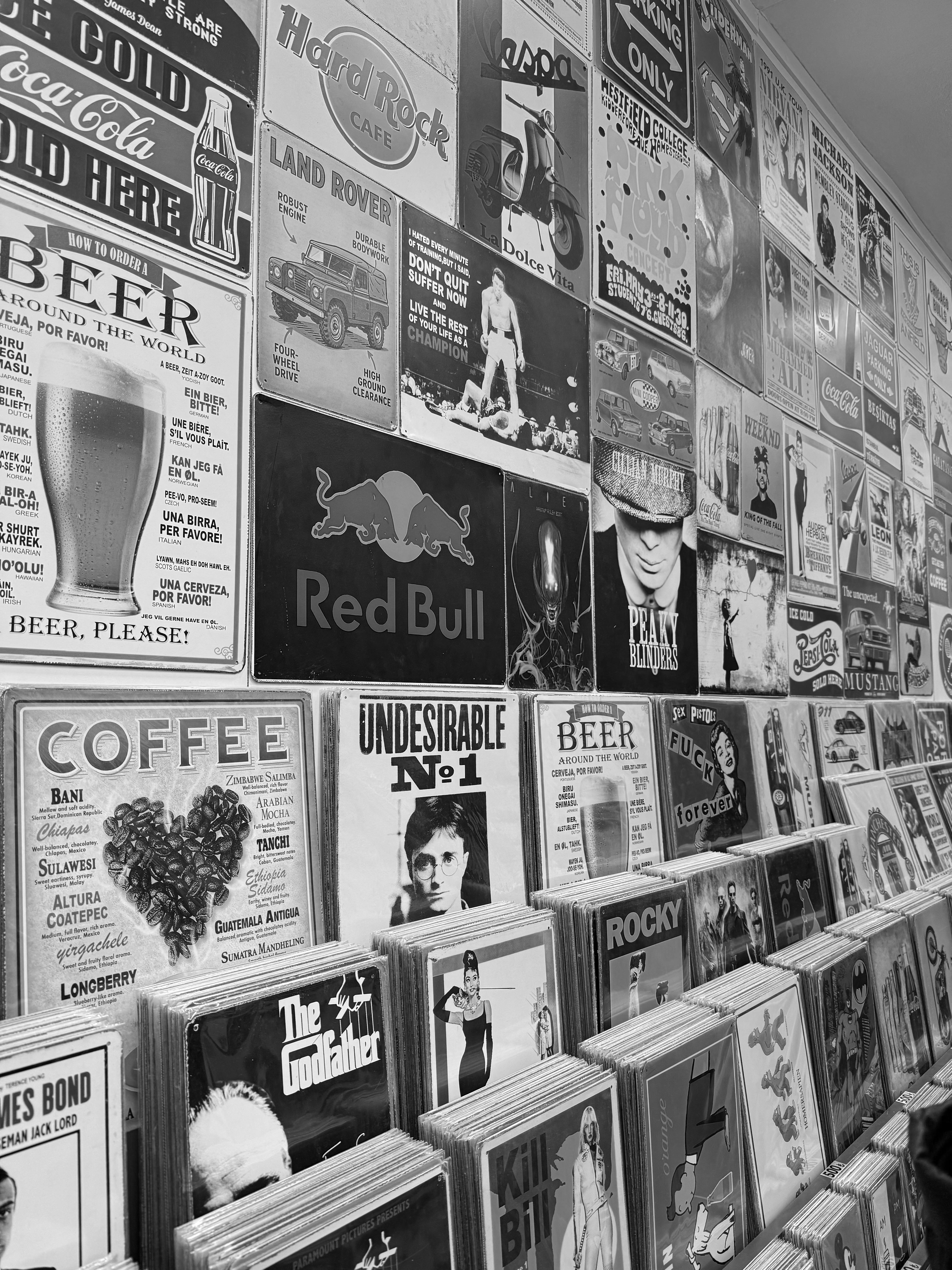 collection-of-vintage-posters-displayed-in-a-black-and-white-retro-setting. - rümeysa-adtp (pexels)