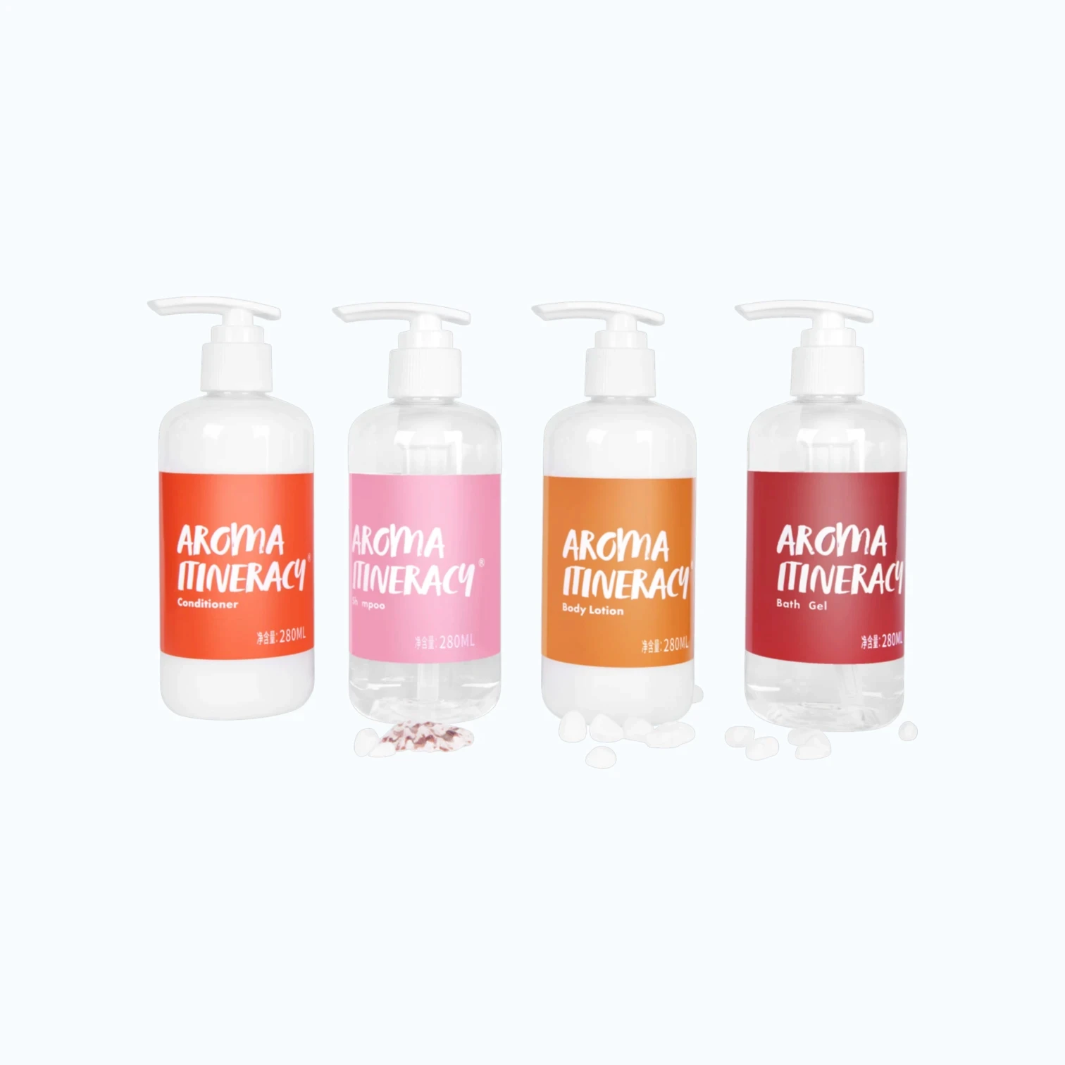Coordinated hotel amenities set with matching shampoo, body wash, conditioner and body lotion packaging.