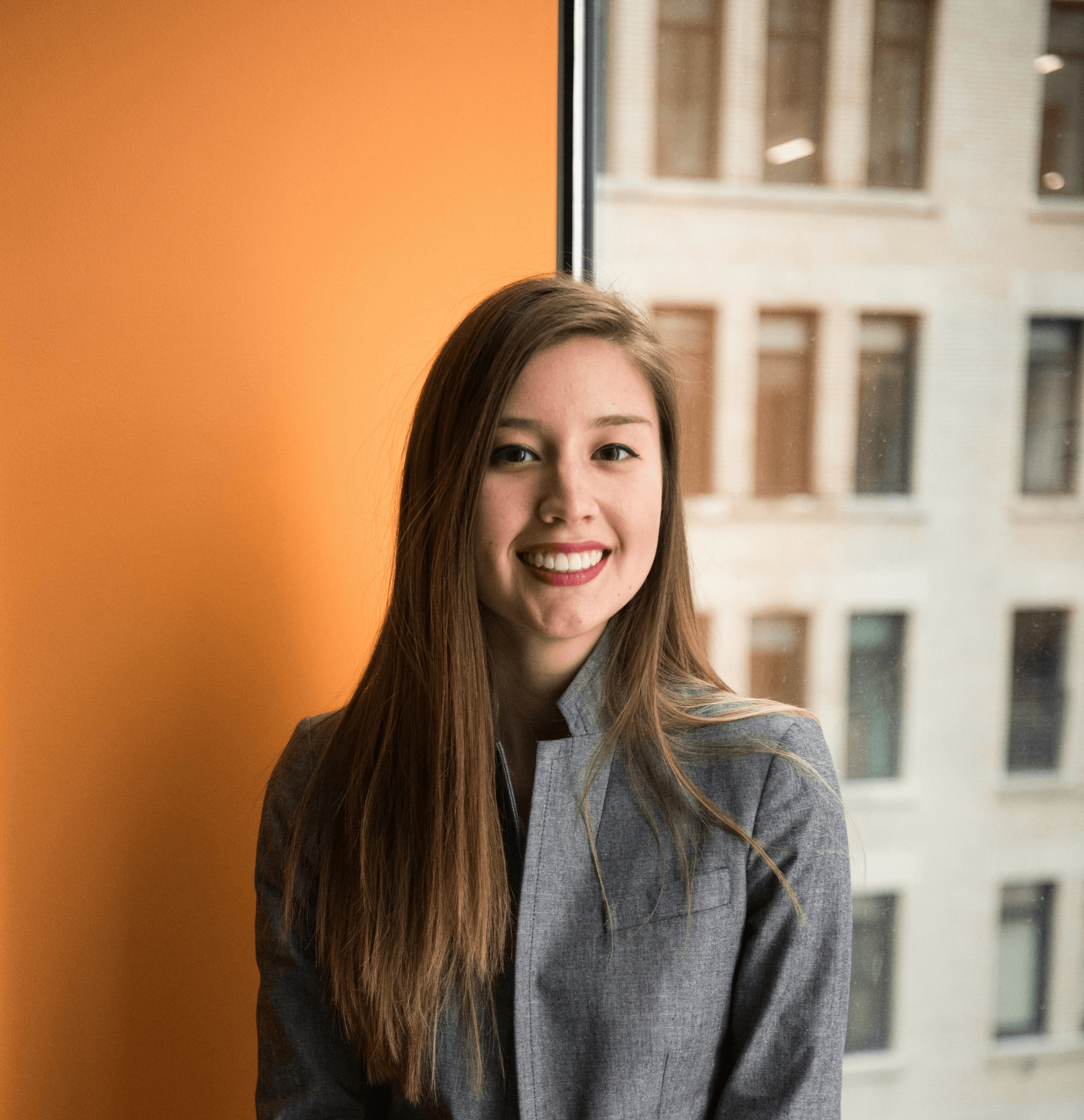 shallow focus photo of woman in gray jacket