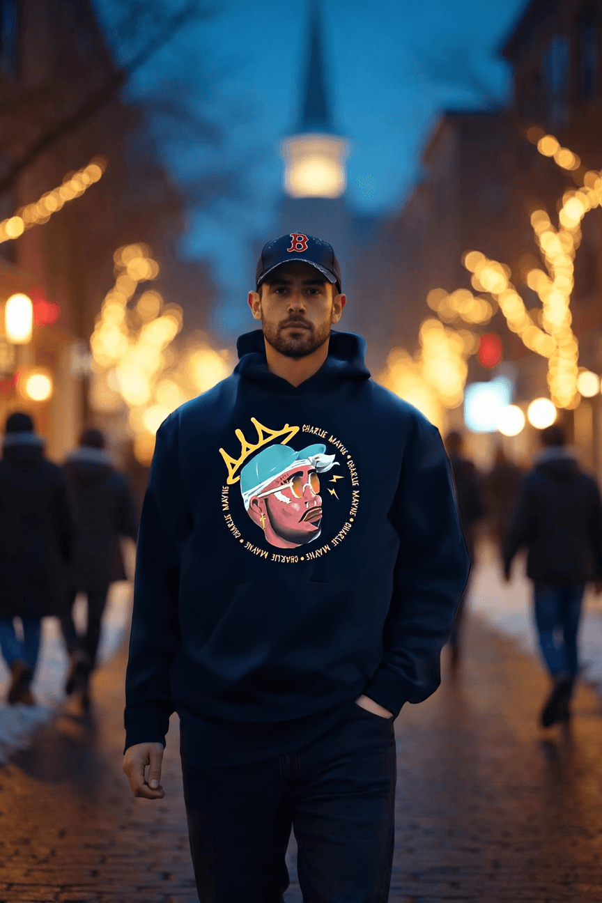 Model wearing Charlie Mayne navy crown hoodie on Church Street in Burlington Vermont