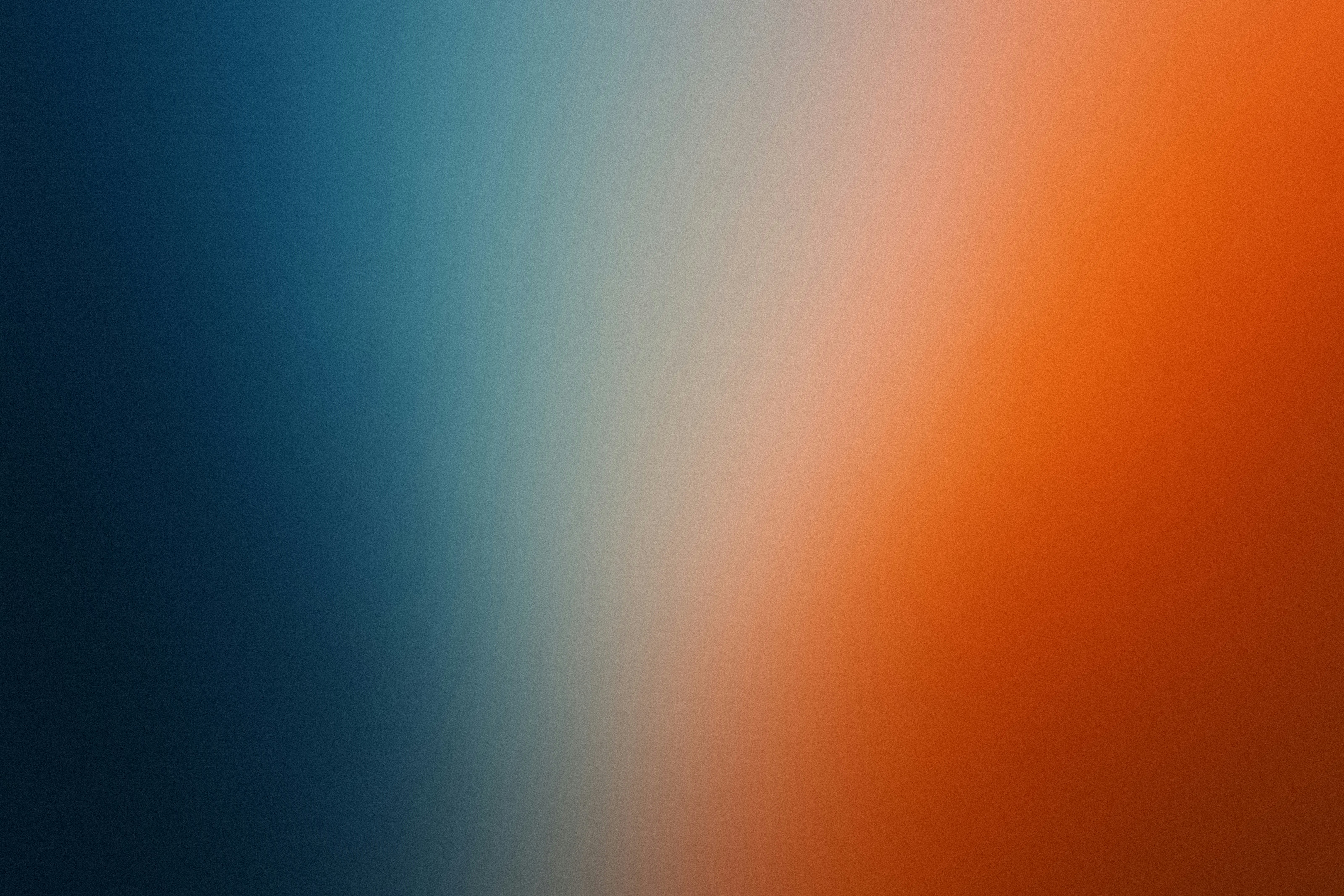 A gradient of blue, white, and orange.