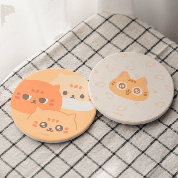 Close-up of lush, dark green leaves, some glossy and wet, against a muted background.