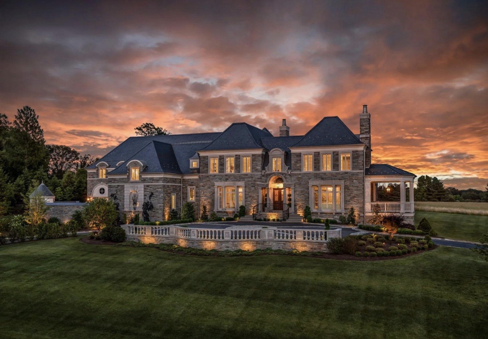 Illustrative luxury home at sunset, not a completed ACE project
