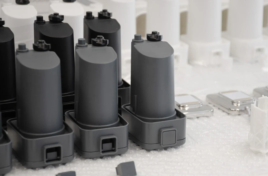 Row of Cutitronics device cartridges during manufacturing process, highlighting scalable product engineering and prototype production.