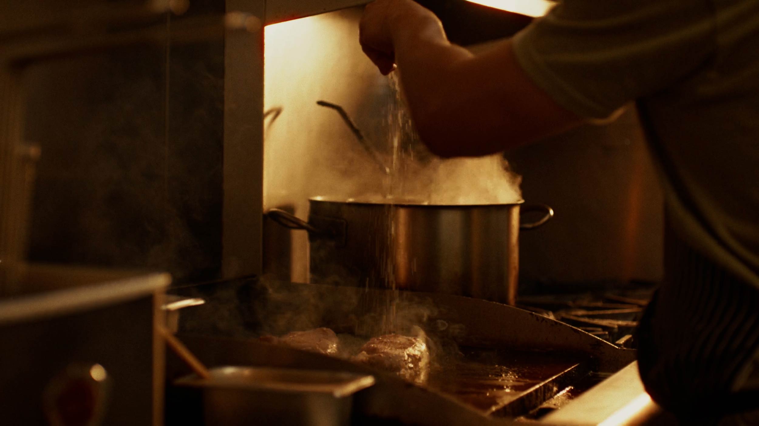 Streetside billboard with flyposters of the Batch.Works brand and illustrations