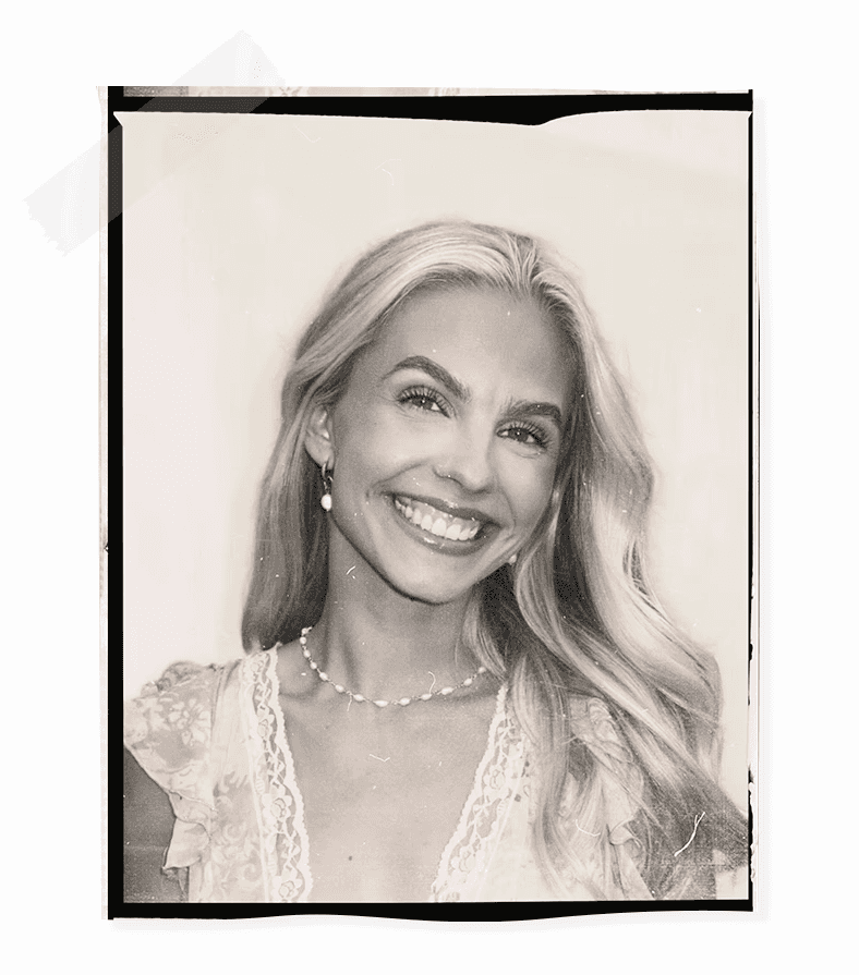 Laptop displaying website on wooden table