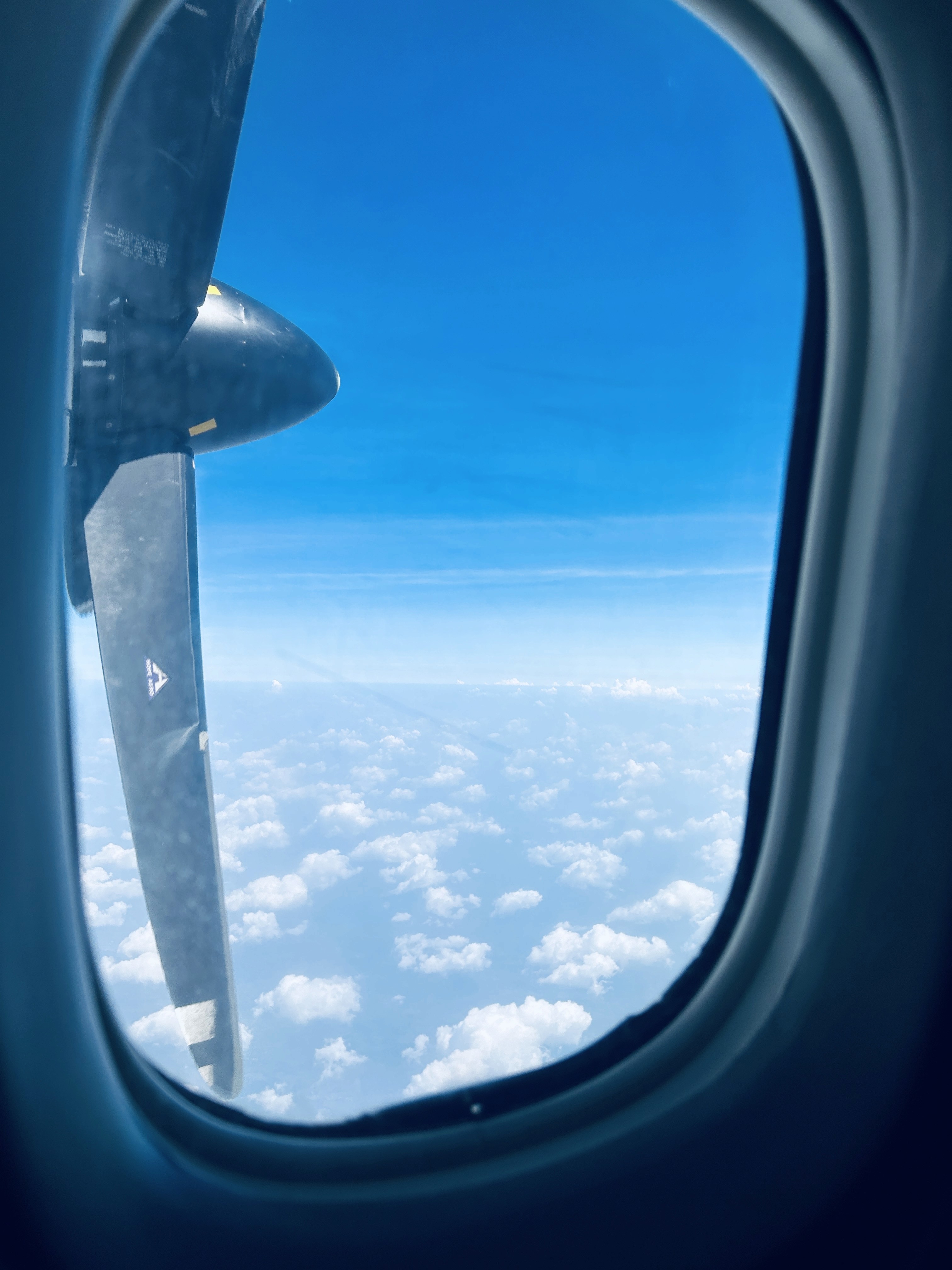 a group of people walking on a sidewalk