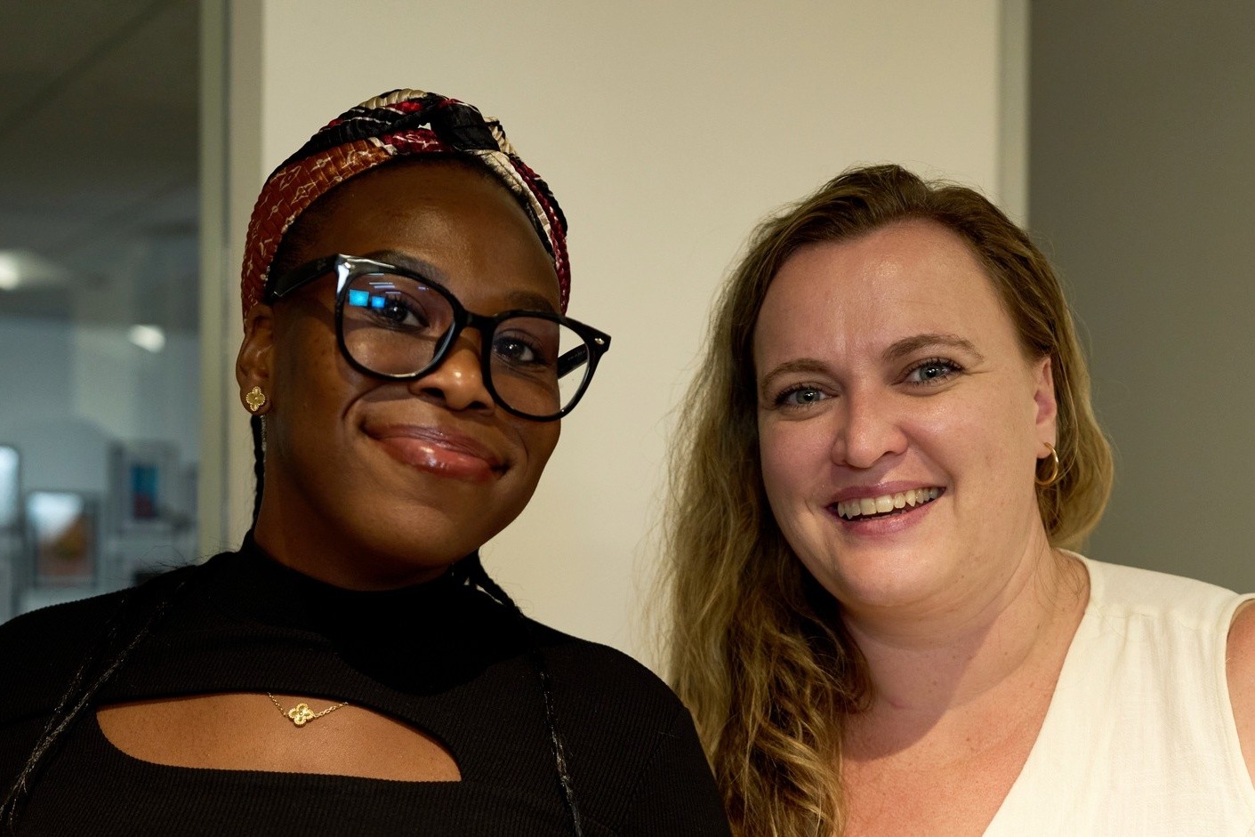 Two Ascent colleagues connecting at a company event