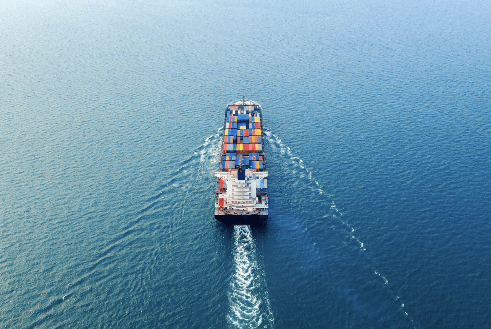 container cargo ship transporting goods at sea