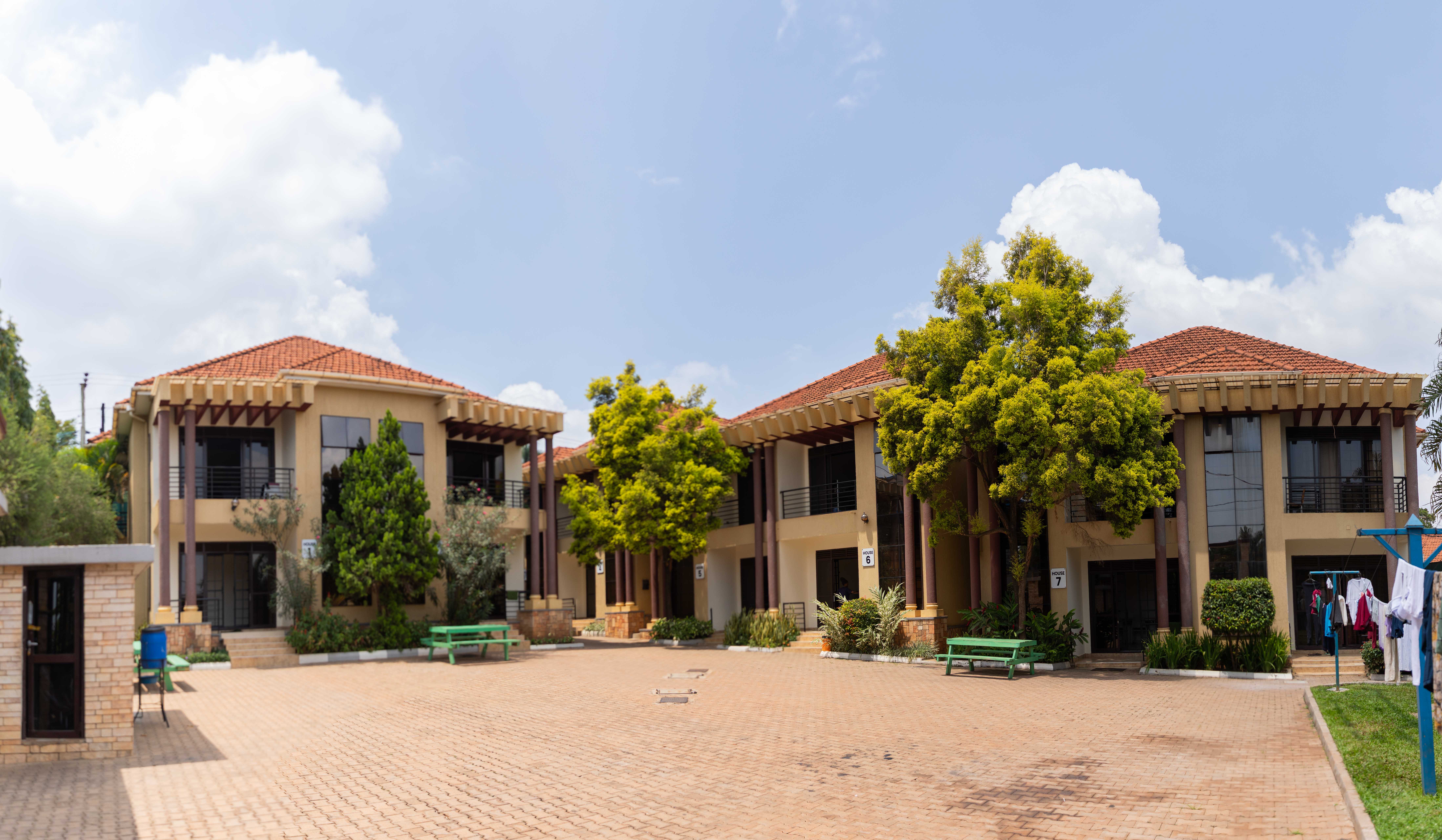 A school building stands against the backdrop of a clear sky