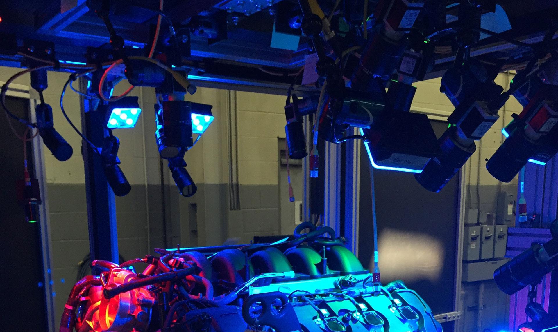 Robotic camera system performing end-of-line quality inspection on automotive parts