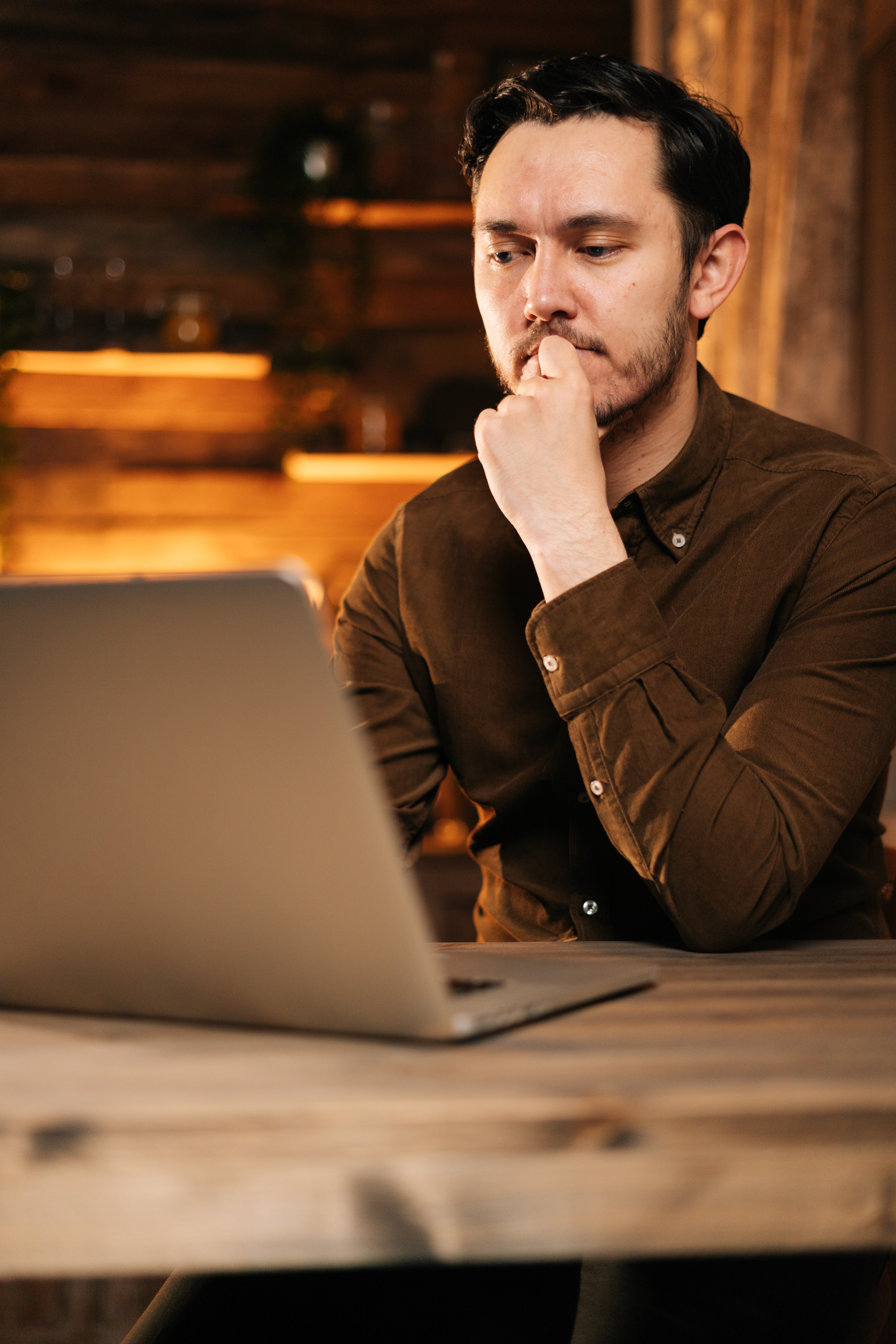 girl using laptop and drinking coffee